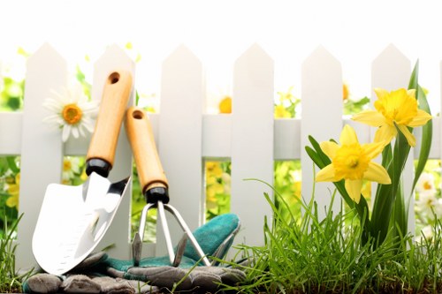 Team member using protective equipment during gardening work
